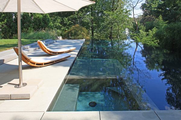 This natural pool in Talgarno, Victoria, uses plants for aesthetics, and a  BIOTOP filter is tucked under the deck: “Algae is not a dirty word for us –  we