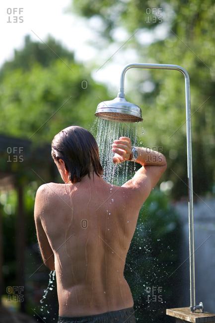 naked outdoor shower flaunting it was wearing much less than as he enjoyed  an outdoor shower