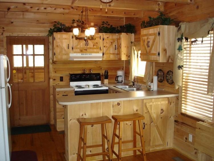 Small modern kitchen with custom copper backsplash that also adds  pattern [From: Regina Bilotta